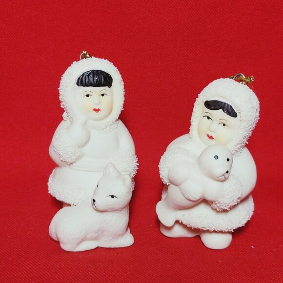 Christmas Ornament Arctic Kids of Alaska Snow Babies Baby Holding Seal and Dog S - Picture 1 of 10